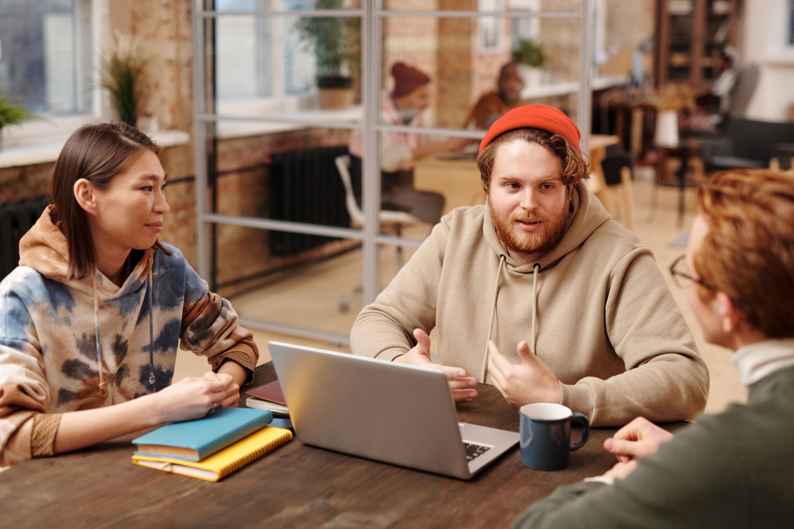 Employee experiencing workplace stress and presenteeism while working at a desk